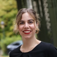 Portrait of a woman with trees in the background